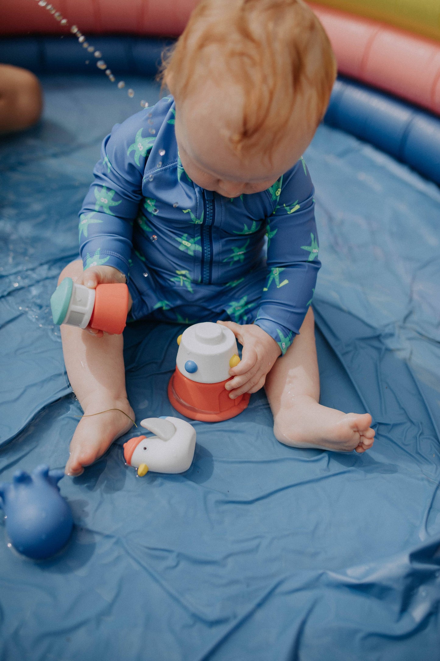 Itzy Stack & Squirt™ Bath + Water Toy