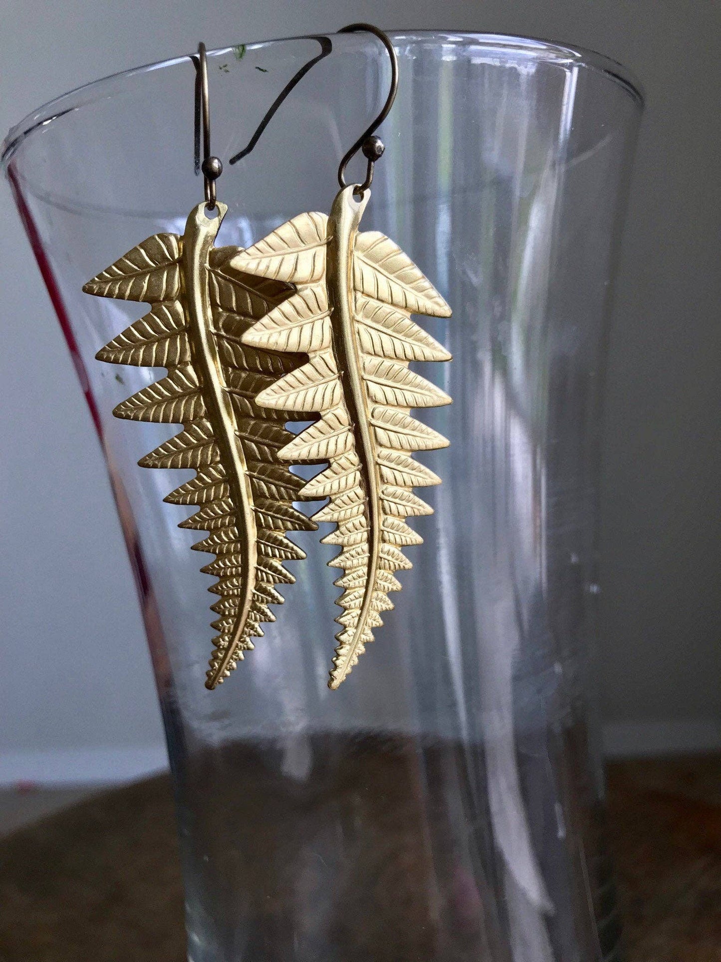 Large brass fern earrings