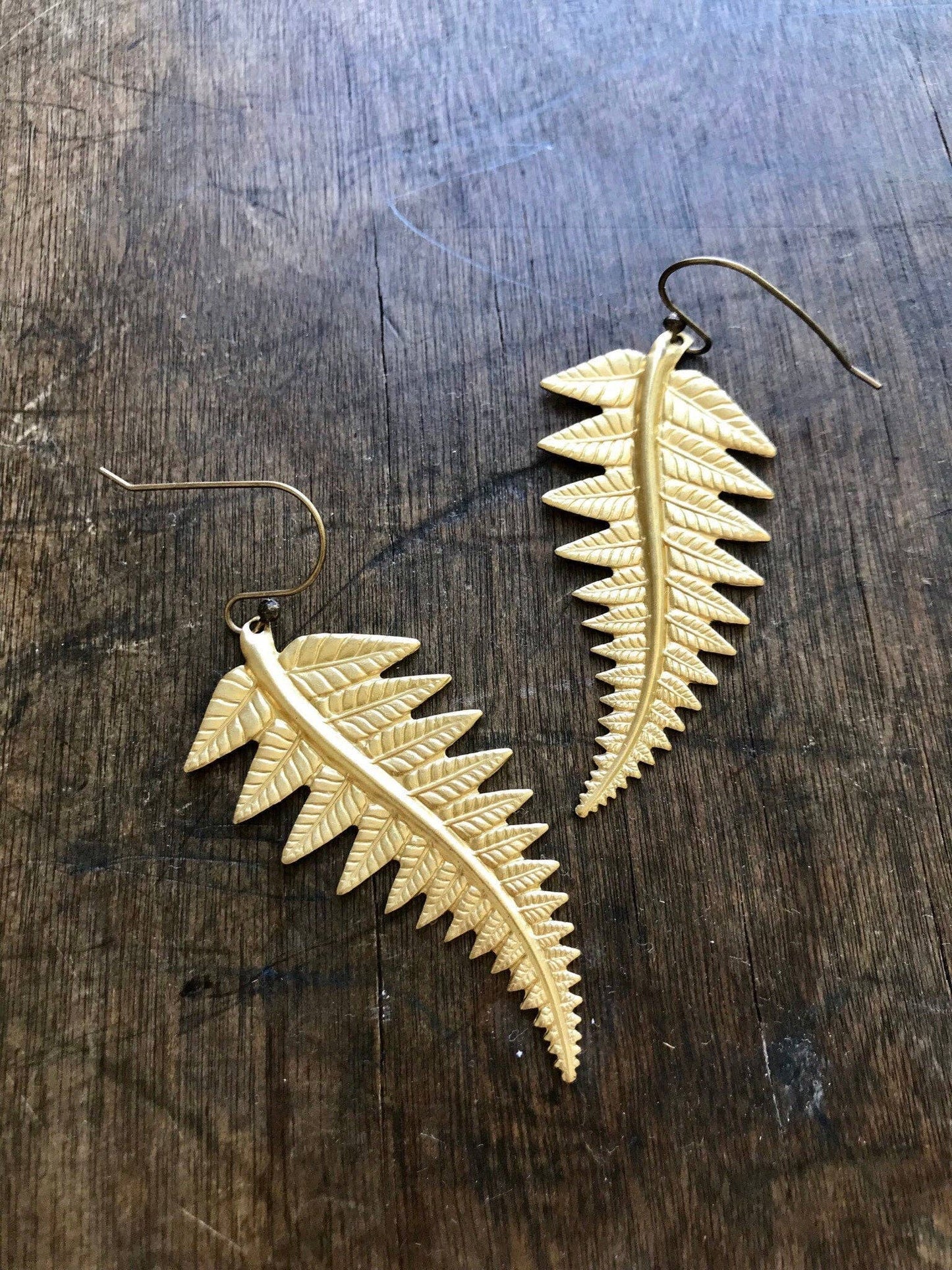 Large brass fern earrings