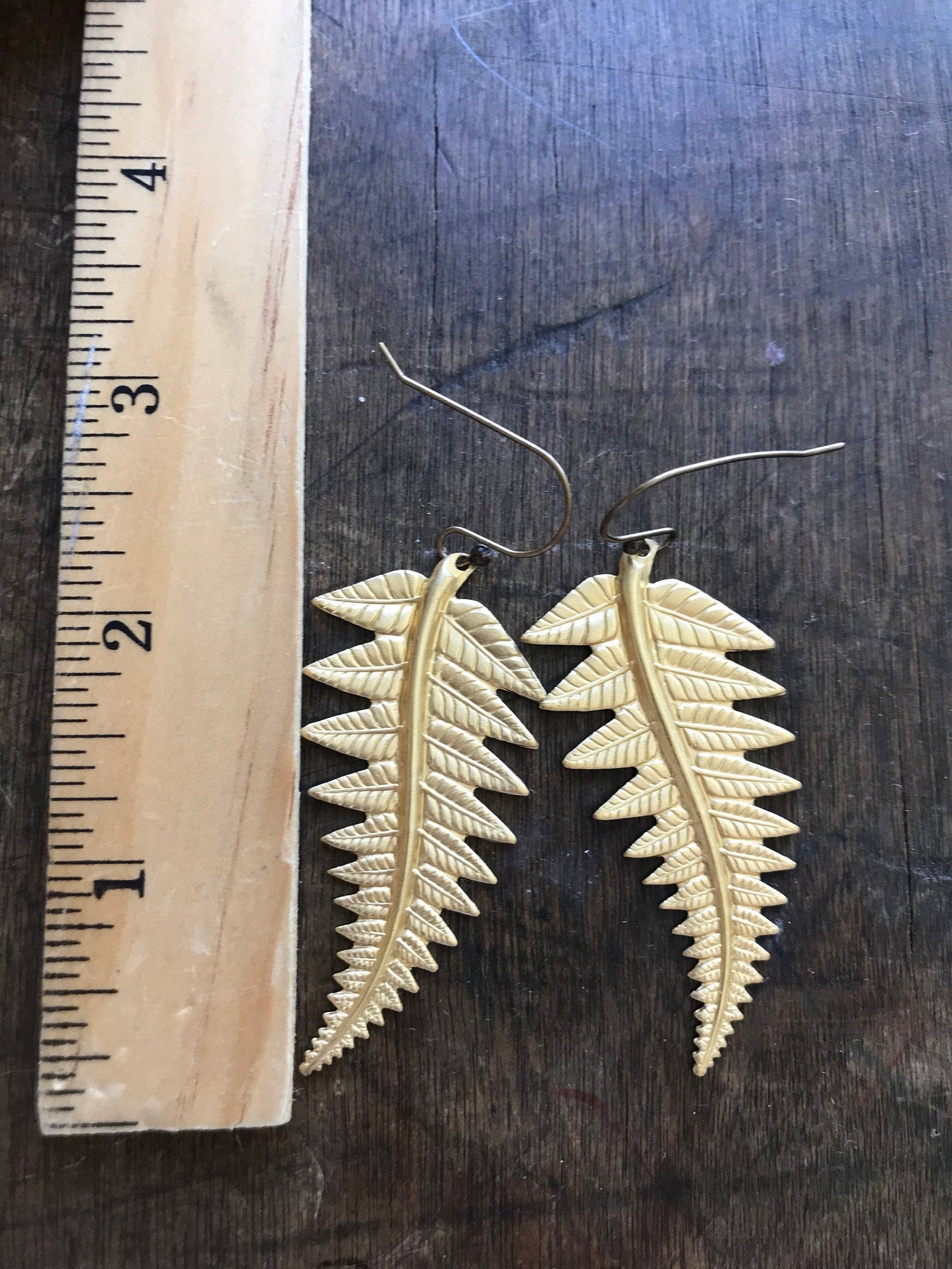 Large brass fern earrings