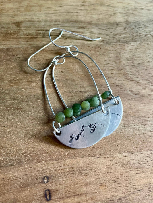 Hand stamped silver mountains with faceted jade stones earrings