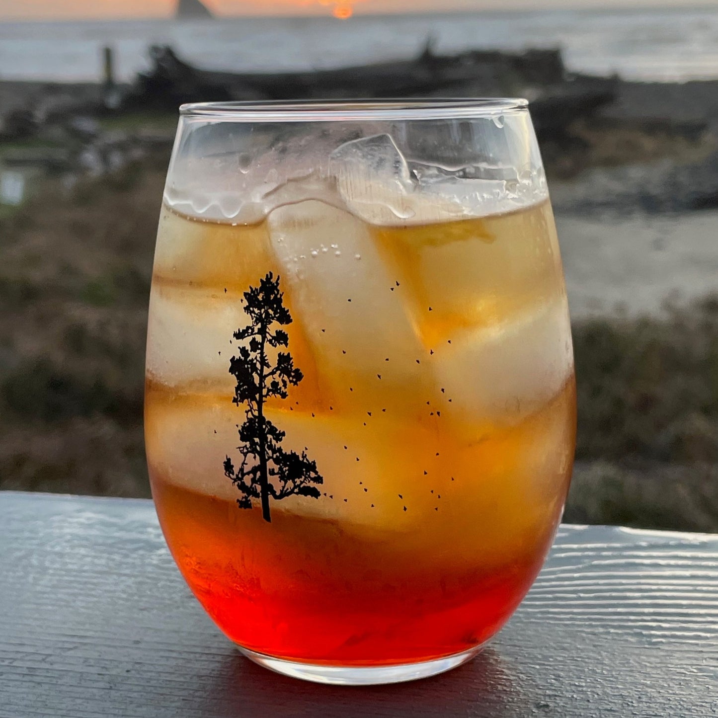 Pine Tree Flock Stemless Wine Glass